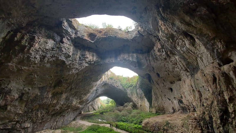 Sofia: Lovech, Devetashka Cave, and Krushuna Waterfalls Tour - Lovech’s covered bridge, fortress exterior, and old Revival houses