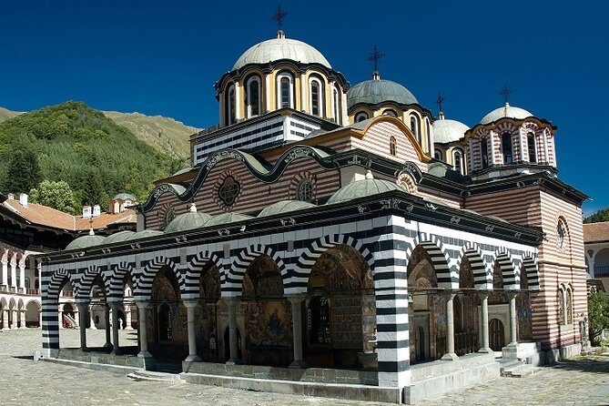 The Cave of Saint John and Rila Monastery - Shuttle Day Tour - Entering Rila Monastery: frescoes, icons, and the story behind the stones